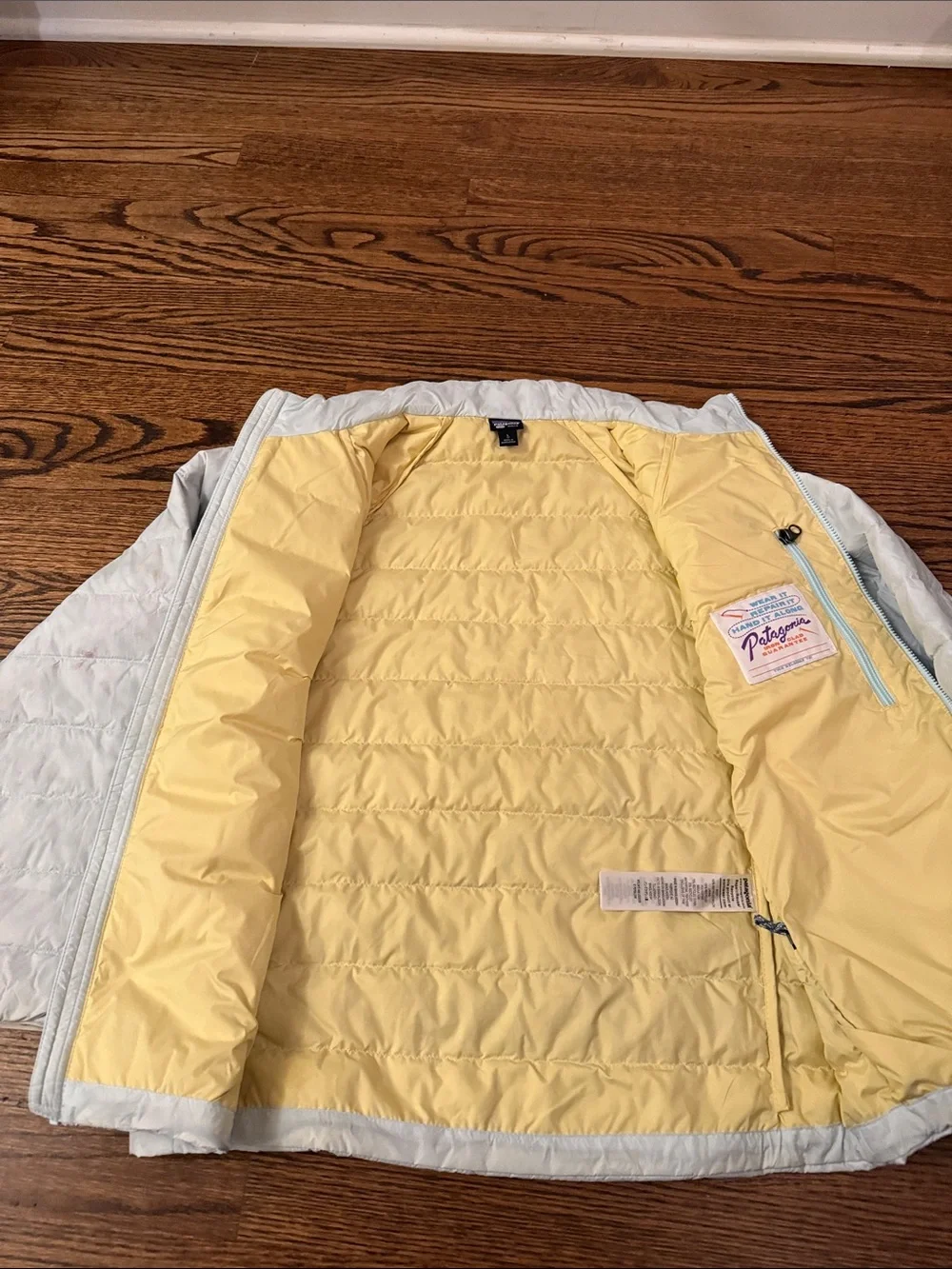 Patagonia Kids Light Gray Quilted Puffer Jacket, yellow inside.